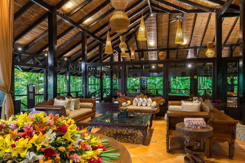 Spacious wooden lobby lounge area at Hideaway Rio Celeste