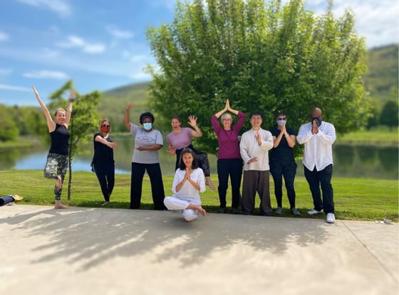 People in different meditating poses at Honor’s Haven Retreat