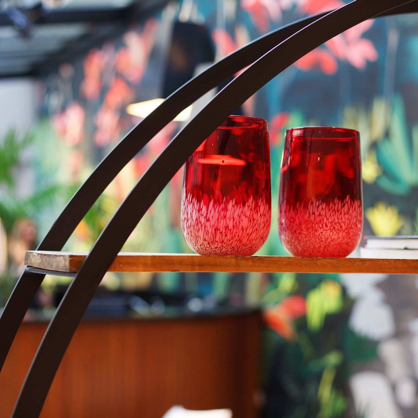 Display of glasses on a shelf at DecO Recoleta Hotel