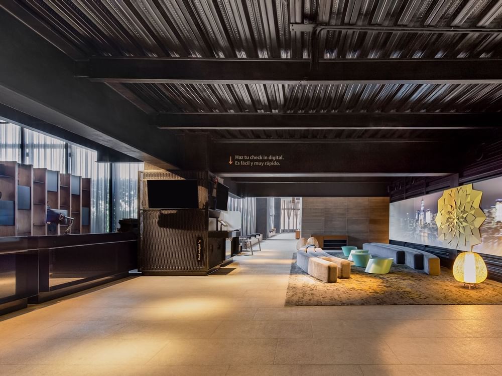 Lobby area with front desk at FA Hotels & Resorts