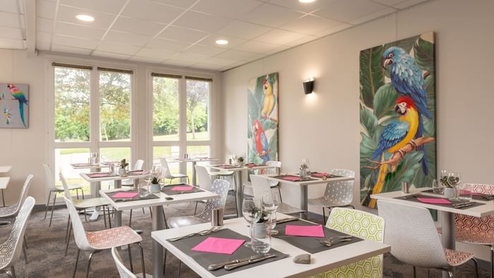 Interior of a dining area at Ara Hotel