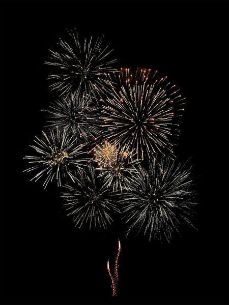 Vibrant celebratory fireworks bursting in the night sky at Warwick Jeddh Hotel & Spa
