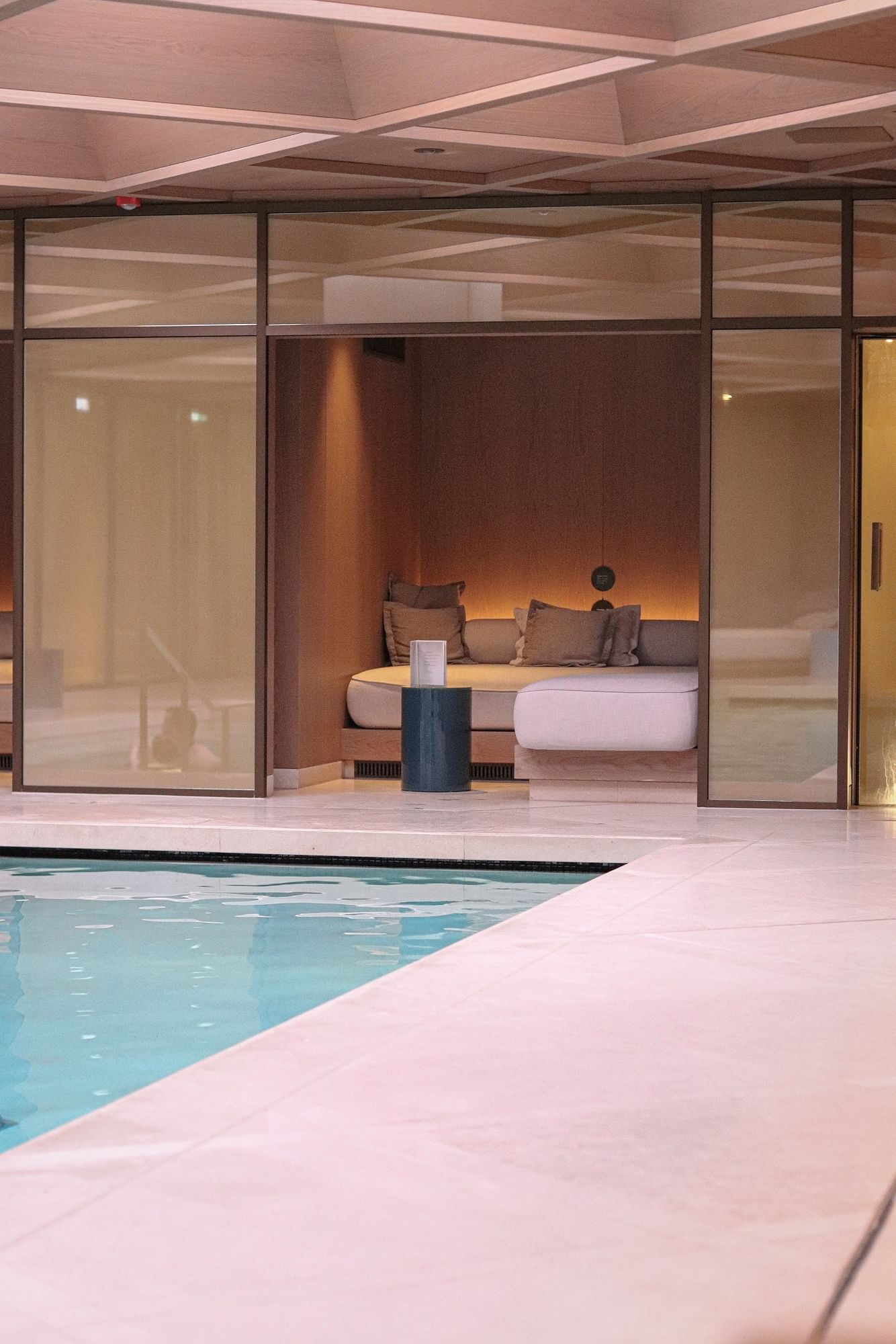 Interior of the indoor pool at The Londoner Hotel