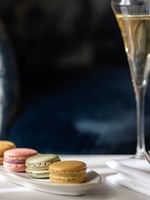 Macarons and champagne on a tray at Hôtel Westminster - Paris.