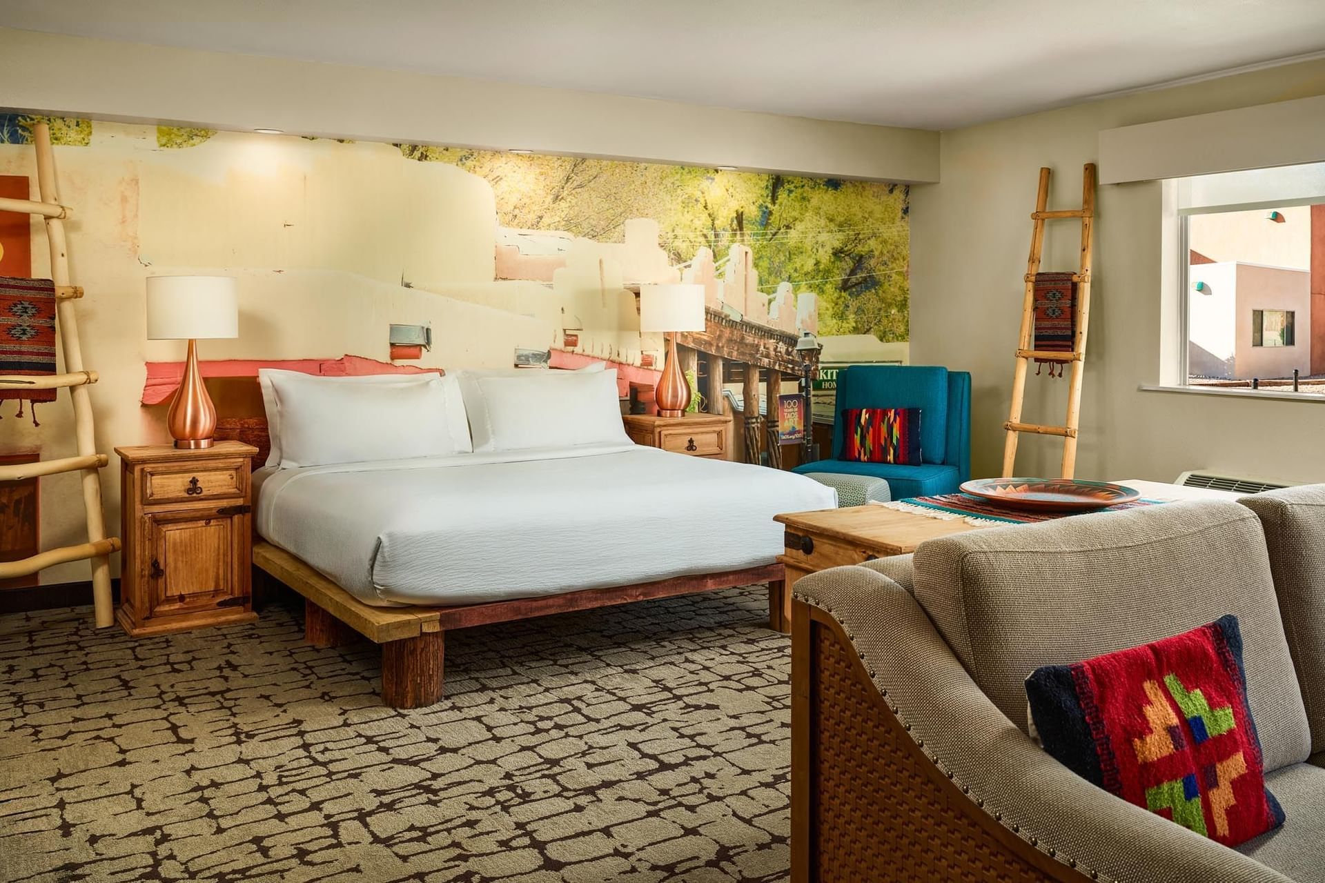 king bed with New Mexico decor and seating area