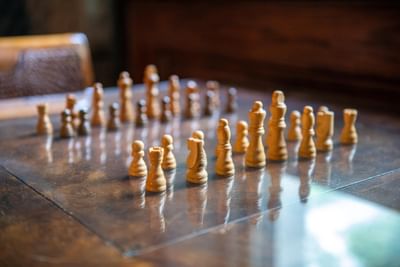 Arranged chess pieces on the marble at Castle Hotel and Spa