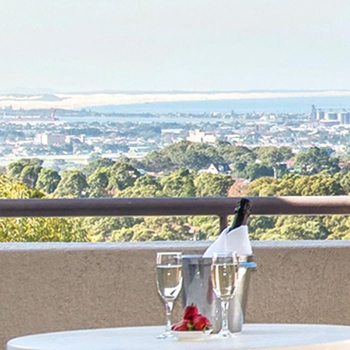 Champagne & strawberries served on the Privilege King room balcony lounge overlooking the city at Mercure Charlestown