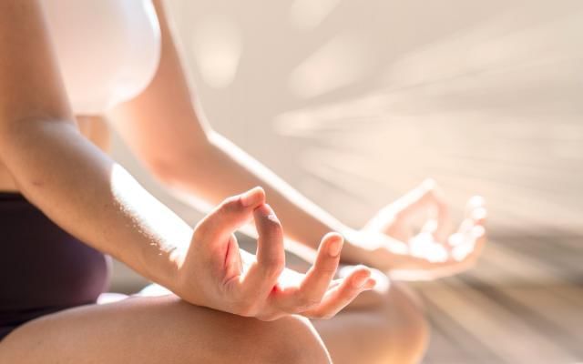 Women meditating on a yoga retreat