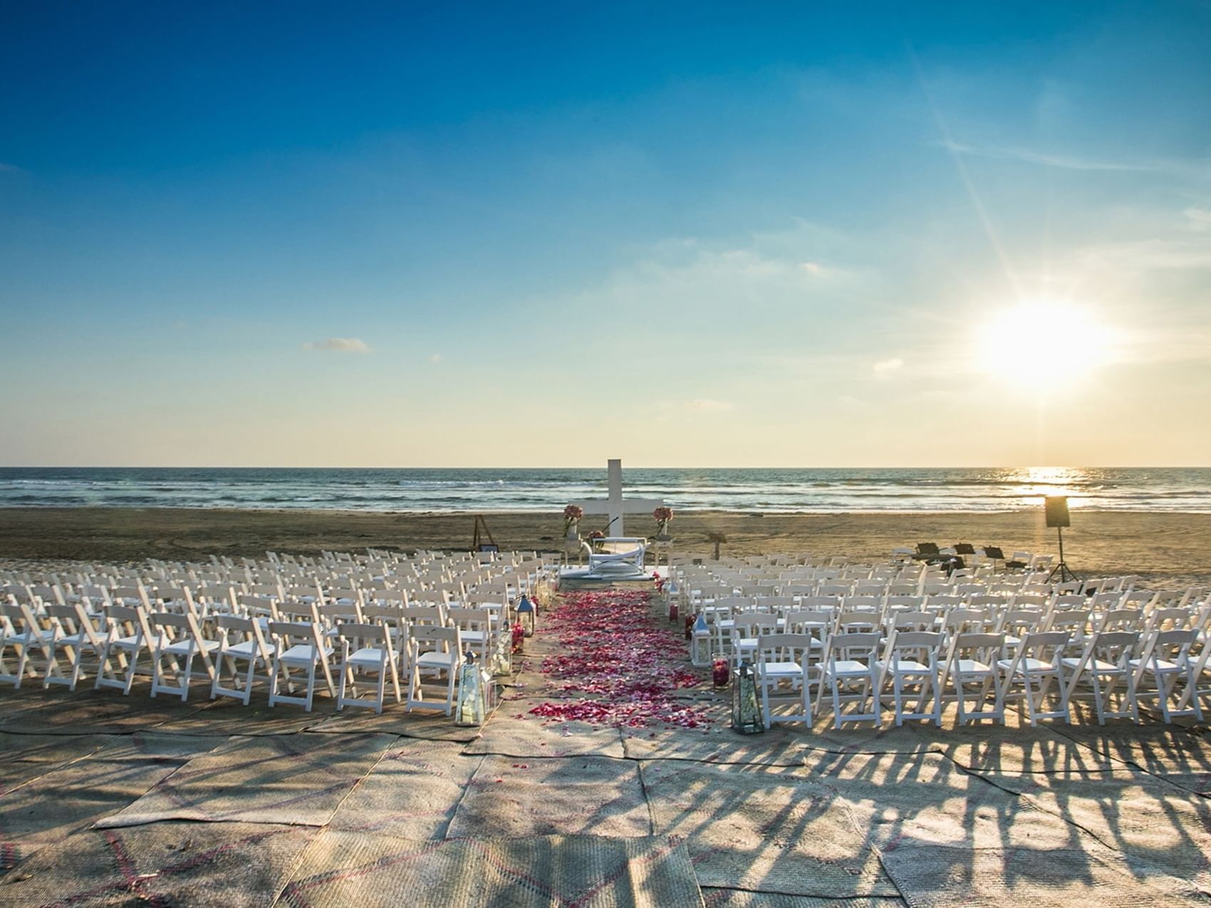 Outdoor wedding ceremony by the Pierre Beach at Mundo Imperial