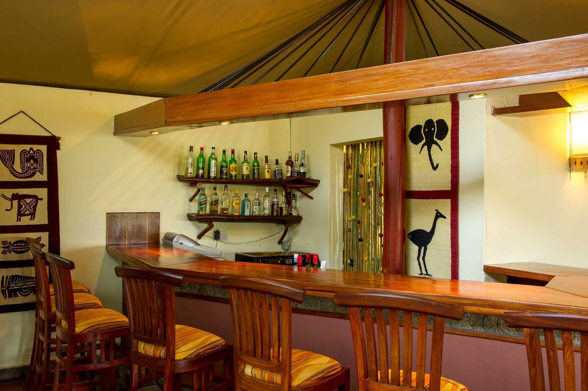 Chairs in Bar counter at Mbuzi Mawe Serena Camp