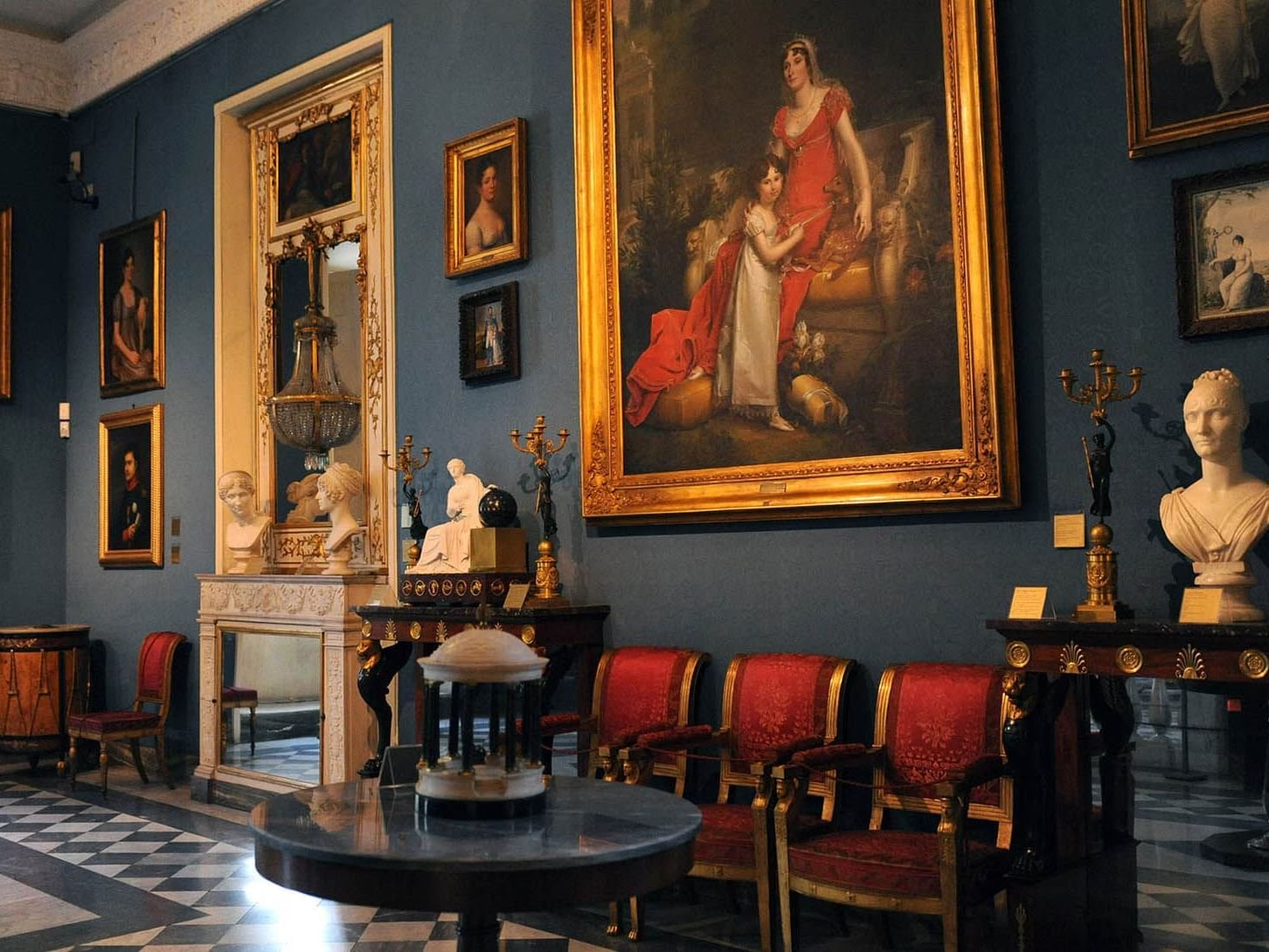 Elegant Napoleonic Museum with classical paintings, ornate furniture, and decorative sculptures near The Guardian Hotel