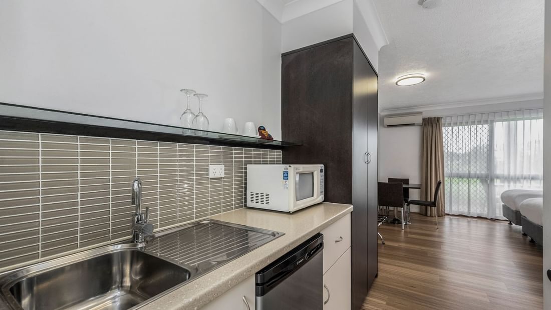 Family Rooms at the Mercure Townsville feature a sink, bar fridge, microwave and tea and coffee making facilities