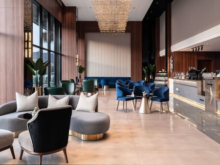 Counter with set-up tables in Khva Cafe at Warwick Hotels & Resorts