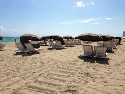 Private beach with lounge area near Albion Miami Beach