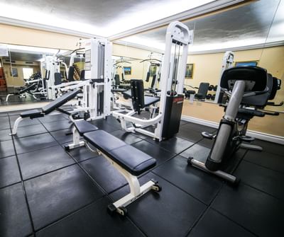 gym with bench and machines
