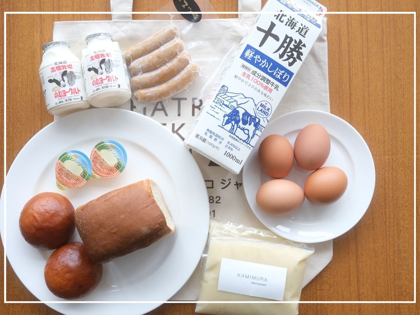 Breakfast hamper with eggs, bread and milk at Chatrium Niseko Japan