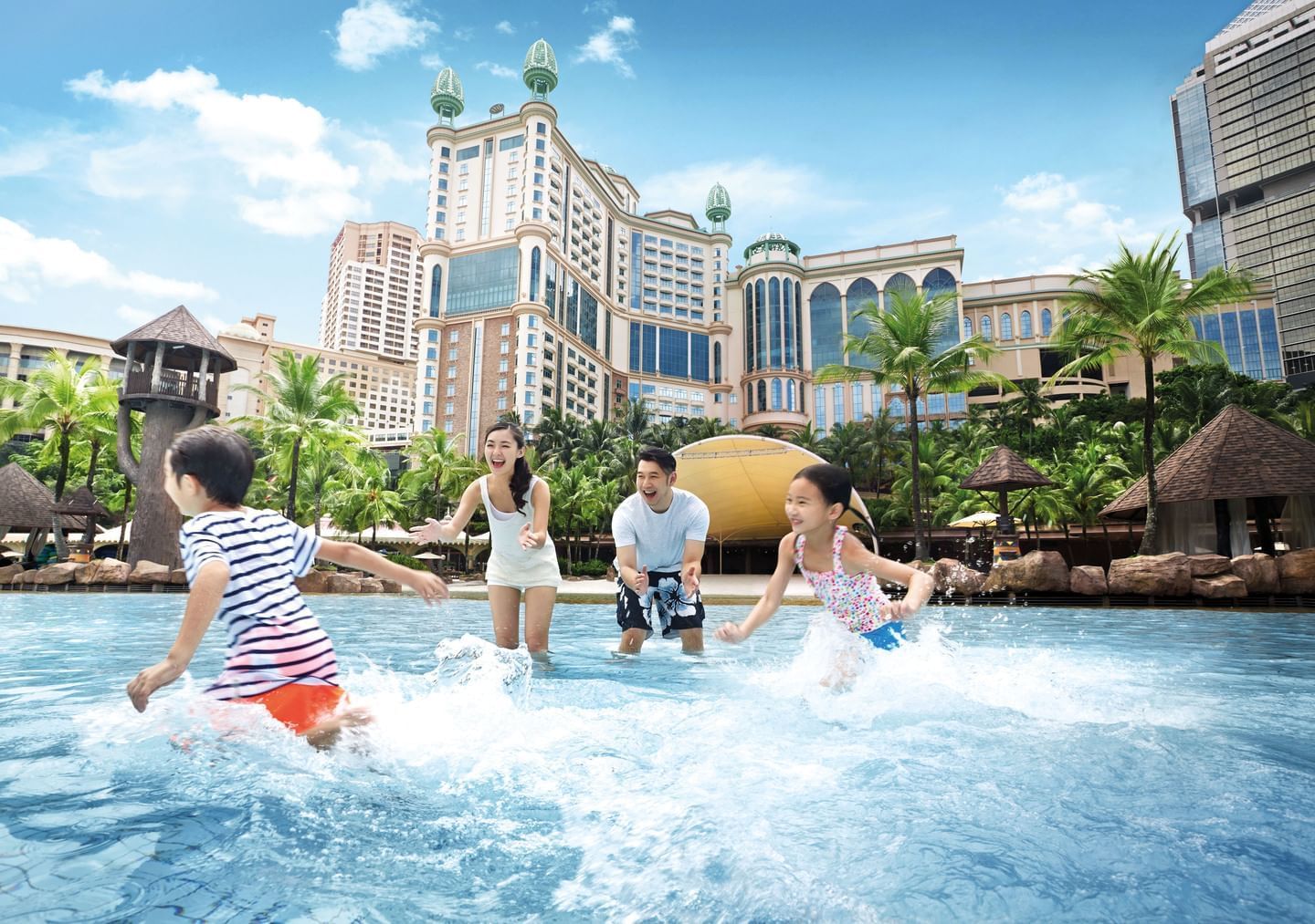 A family enjoying the outdoor water activities at Sunway Hotels & Resorts
