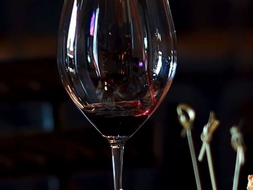 Close-up of a glass of wine served in Brapanta at Las Casitas Village
