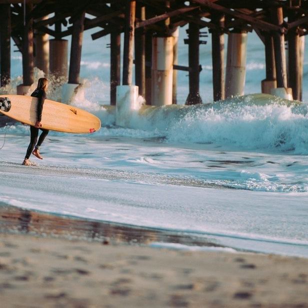 Surfer getting ready to surf.