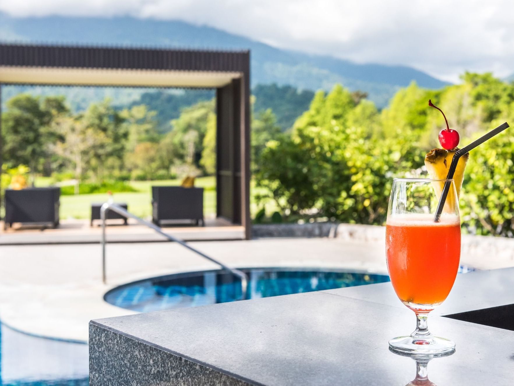 Close-up of a drink served by the pool at Chatrium Golf Resort