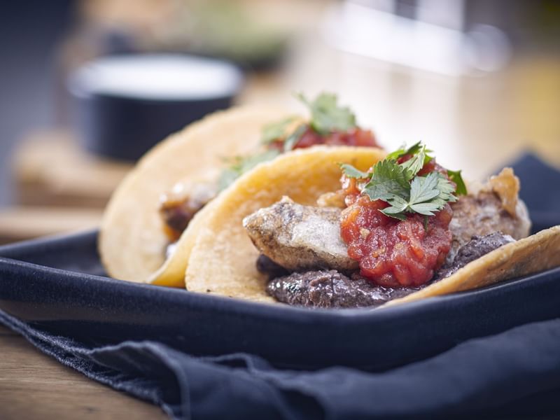 A Tacos plate served in J Folklore Mexicano at Gamma Hotels