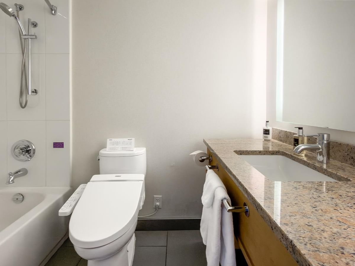 Hotel bathroom with bathtub and toilet