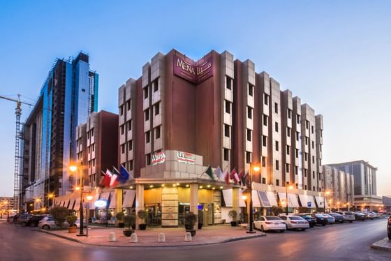 Exterior view of the Mena Hotel Riyadh Building at night