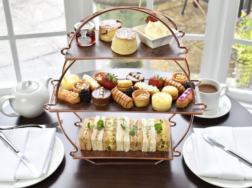 Luxury afternoon tea with scones, cakes and sandwiches at Gorse Hill in Woking, Surrey