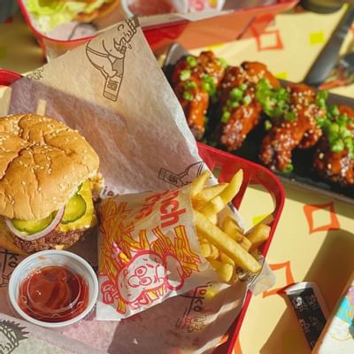 Close-up of Burger and Fries served at Backstage at the Verb