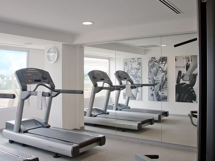 Treadmills in the Gym Wellness Center at Fiesta Inn Hotels
