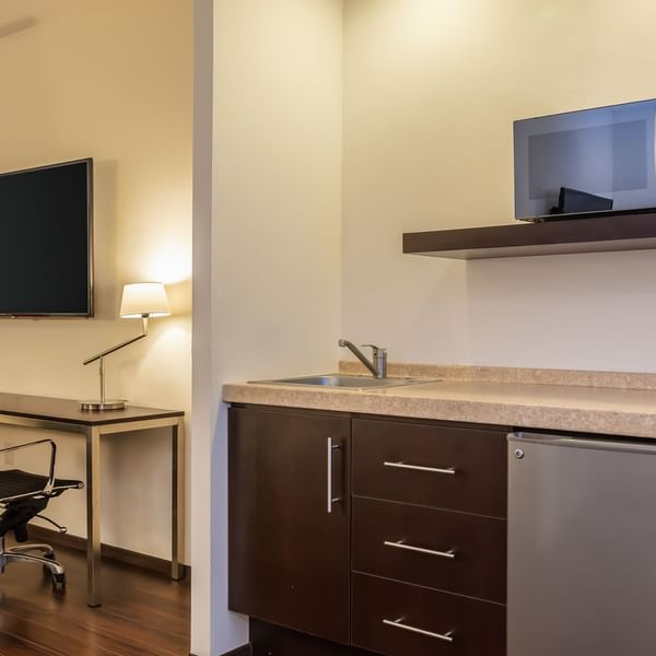 Close up on the kitchenette with microwave at Fiesta Inn