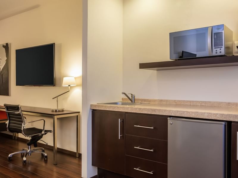 Close up on the kitchenette with microwave at Fiesta Inn