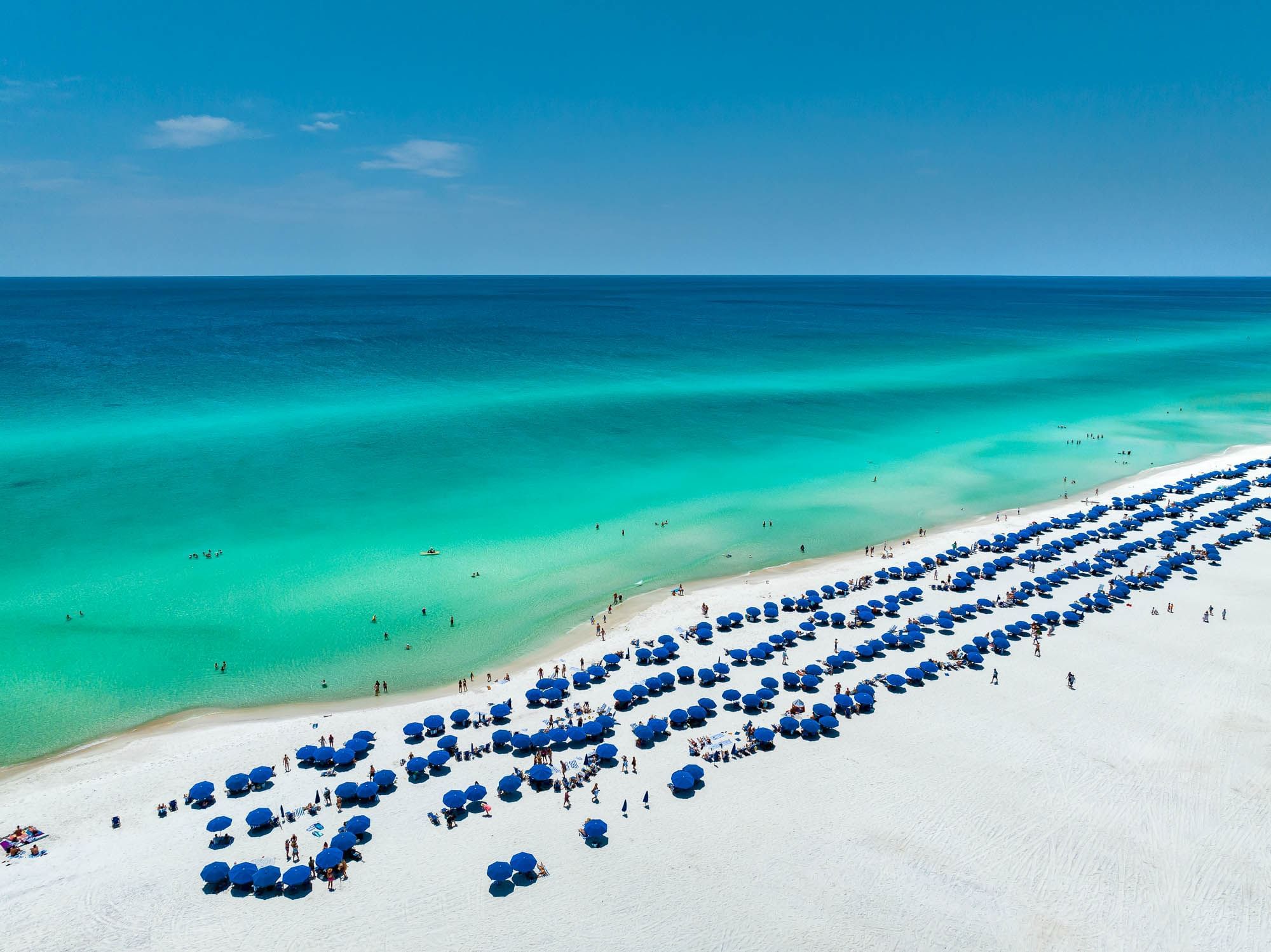 Beach umbrellas on the seashore by ocean front near Camp Creek Inn