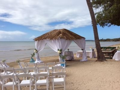 Wedding ceremony arranged on a  Beach Bohio at Copamarina