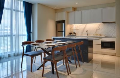 Dining table setup in Pinnacle Suite at Tribeca Serviced Suites