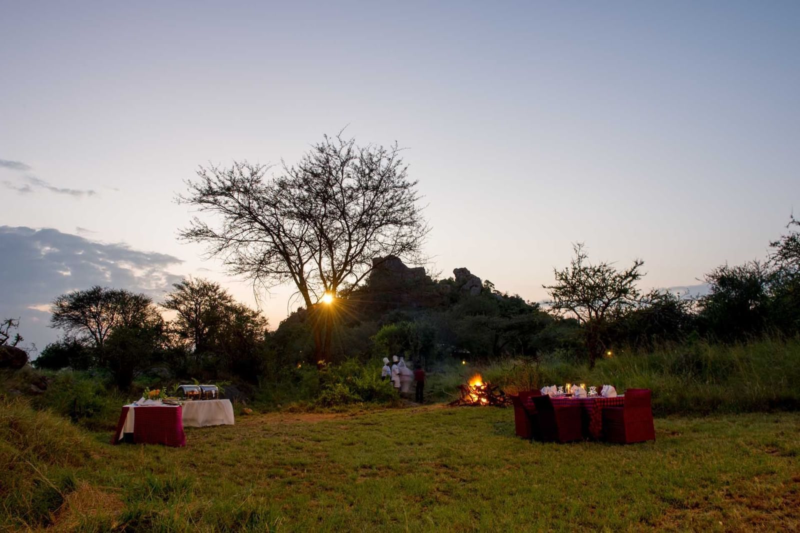 Firepit and Bush dinner at sunset at Mbuzi Mawe Serena Camp