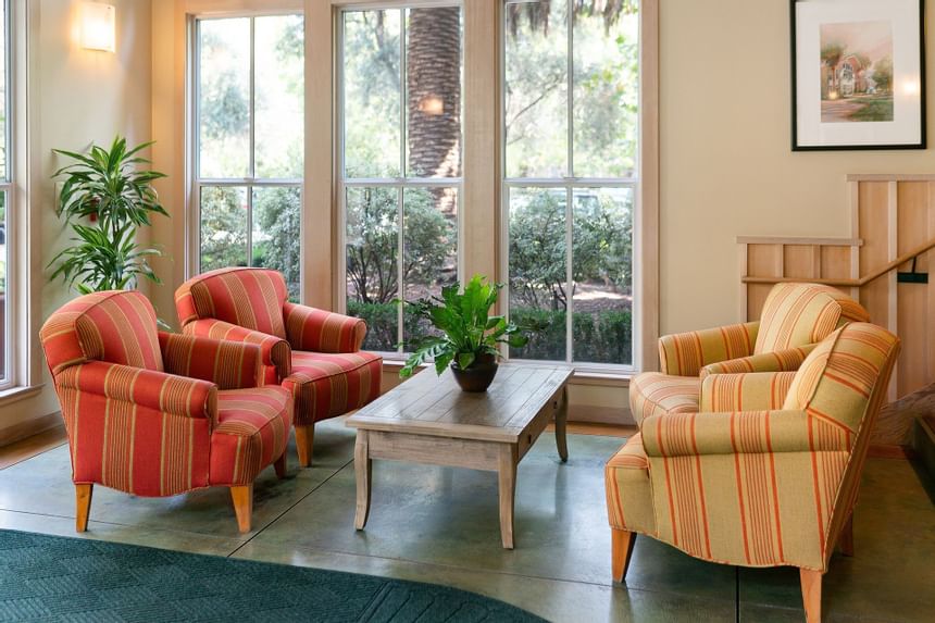 Southbridge lobby seating area with four chairs and coffee table