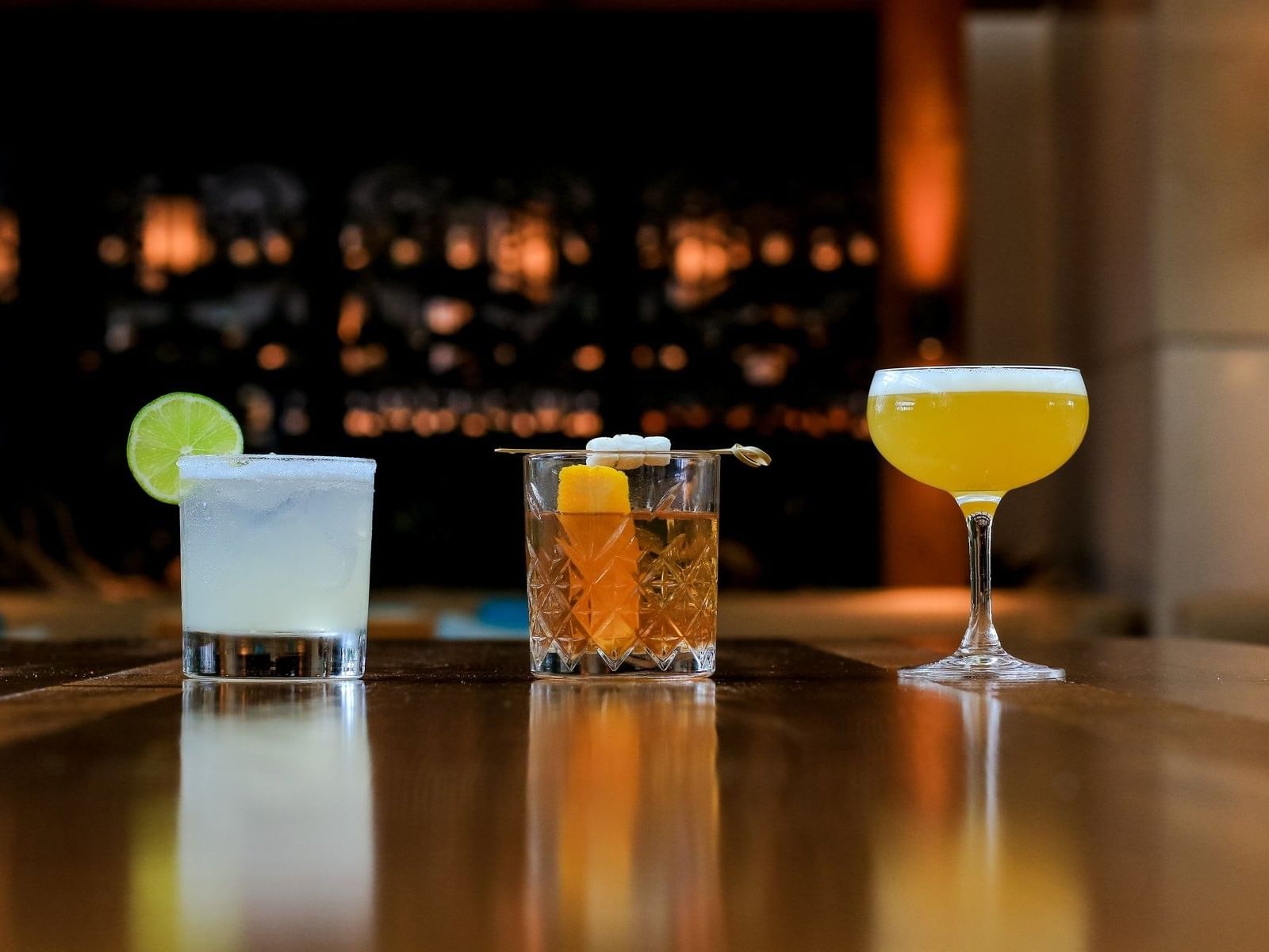 Close-up of cocktails on the bar counter at The Diplomat Resort
