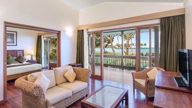 Bedroom & lounge area in One-Bedroom Villa at The Naviti Resort - Fiji