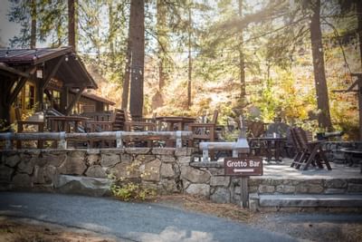 Outdoor dining area in Grotto Bar at Sleeping Lady at sunset