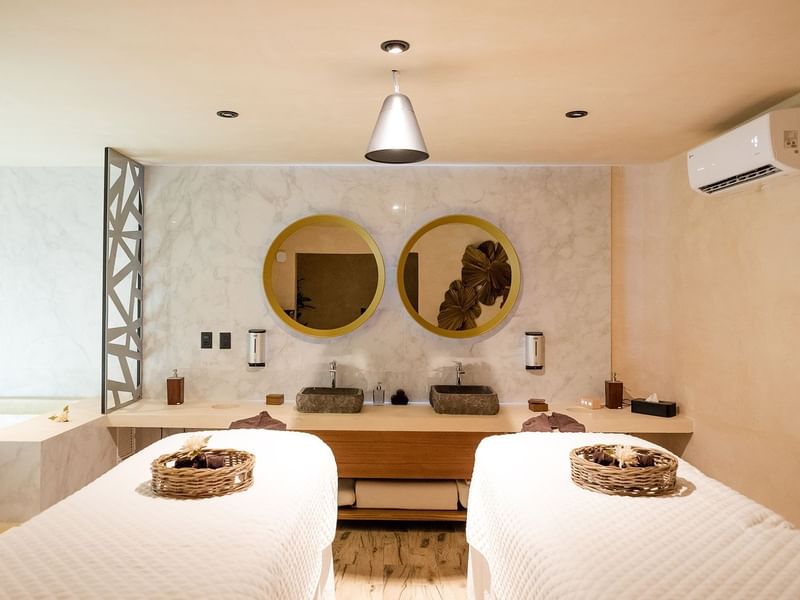 Get a relaxing massage in our private rooms in the Ome Spa at The Reef Playacar
