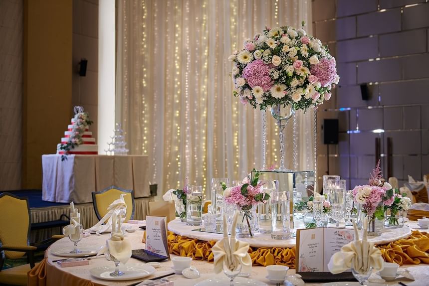 Banquet table decor with flowers at Gardens hotels & residences