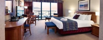 King bed guest room with balcony.
