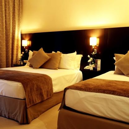 Two beds in Triple room at Labranda Targa Aqua Parc