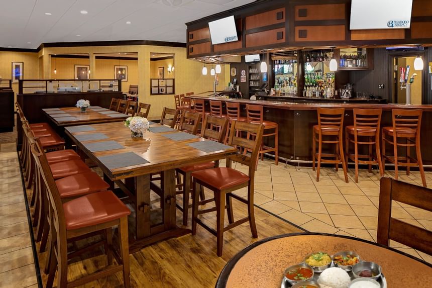 Dining set-up & bar in Minuteman Grille at Boxboro Regency