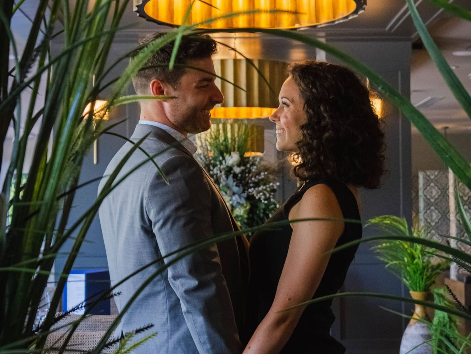 A couple smiling at each other at The Malcolm Hotel