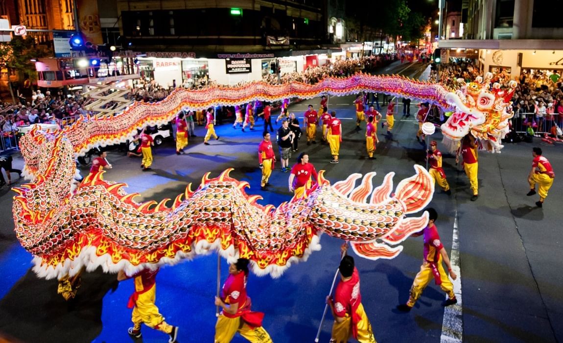 Chinese parade with dragon dancers near Novotel Darling Square