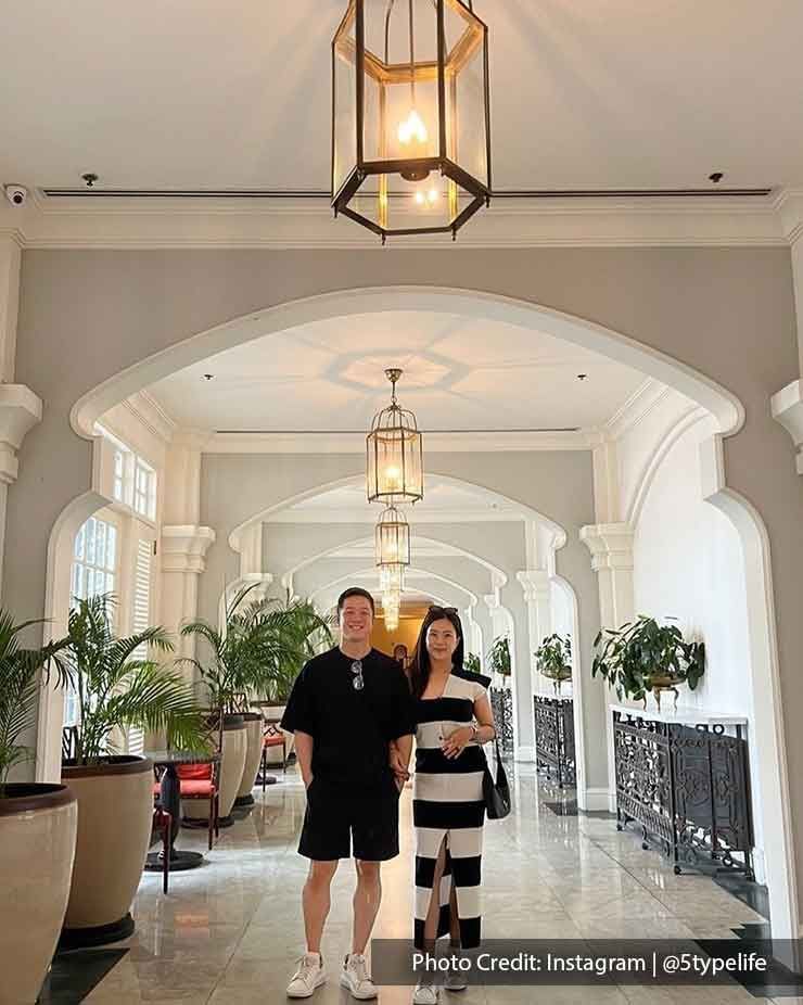 A couple was taking a picture in front of the camera - Lexis Suites Penang