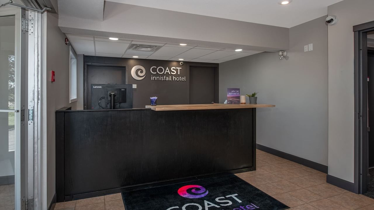 Front desk and lobby at Coast Innisfail Hotel