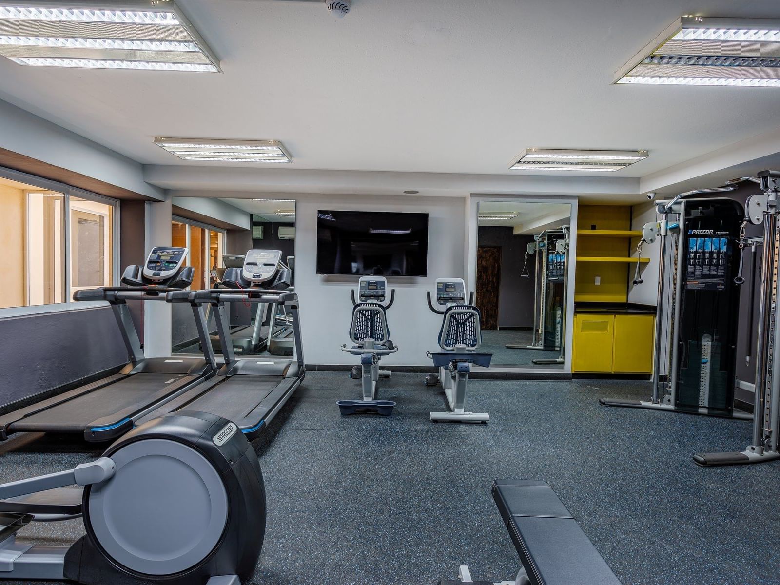 Exercise machines in the fitness center at Gamma Hotels